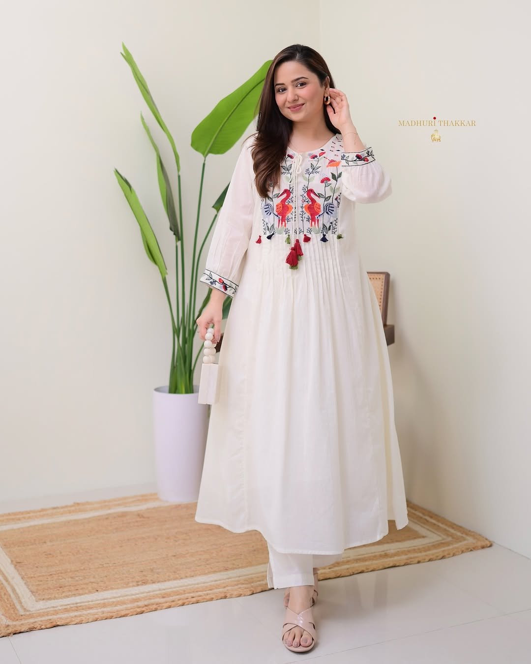 Embroidered White Cotton A-Line Kurta with Hand-Tassels & Bird Motif